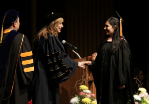 UConn President, Susan Herbst, congratulated each graduating UConn medical, dental and graduate school student (Photo by John Atashian)